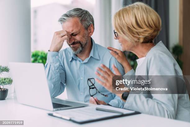 stress at work. - head in hands stock pictures, royalty-free photos & images