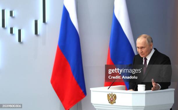 Russian President Vladimir Putin delivers an annual address to the Federal Assembly of the Russian Federation, at Moscow's Gostiny Dvor; the Federal...