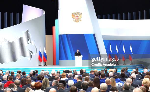 Russian President Vladimir Putin delivers an annual address to the Federal Assembly of the Russian Federation, at Moscow's Gostiny Dvor; the Federal...