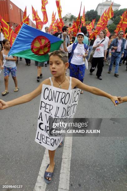Anti-globalisation militants demonstrate during a rally against the Group of Eight summit in Genoa 19 July 200. Leaders from the world's seven most...