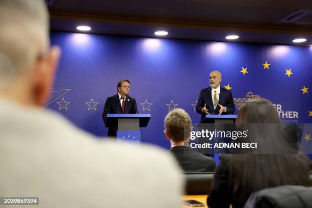 European Commissioner for Neighbourhood and Enlargement Oliver Varhely and Albania's Prime Minister Edi Rama address a joint press conference as part...