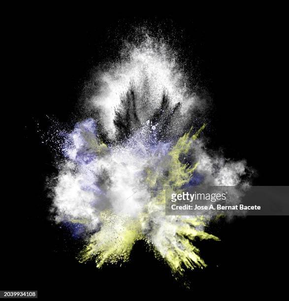 expanding cloud of smoke and dust from an explosion on black background. - detonator stock pictures, royalty-free photos & images