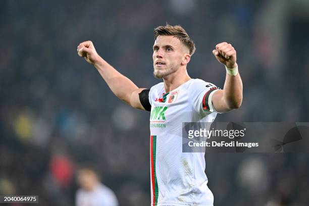 Ermedin Demirovic of FC Augsburg gestures during the Bundesliga match between FC Augsburg and Sport-Club Freiburg at WWK-Arena on February 25, 2024...