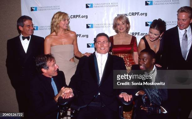 Portrait of American actor Christopher Reeve as he poses with attendees at the Christopher Reeve Paralysis Foundation's 12th Annual Magical Evening...