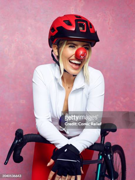 In this image released on February 27 Singer and Radio DJ, Mollie King poses in a studio in the run up to her Pedal Power challenge for Red Nose Day...