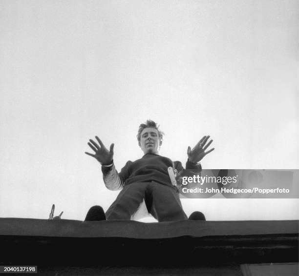 English photographer Antony Armstrong-Jones posed with his camera on a rooftop in London in 1958. Armstrong-Jones would go on to marry Princess...