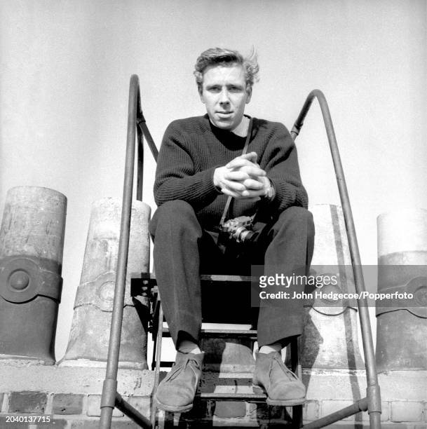 English photographer Antony Armstrong-Jones posed with his camera on a rooftop in London in 1958. Armstrong-Jones would go on to marry Princess...