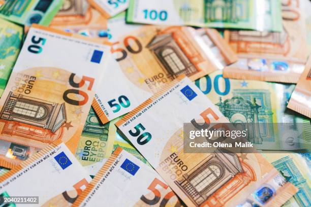 euro banknotes. money background - one hundred euro note stock pictures, royalty-free photos & images