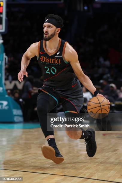 Landry Shamet of the Washington Wizards dribbles against the Cleveland Cavaliers at Capital One Arena on February 25, 2024 in Washington, DC. NOTE TO...