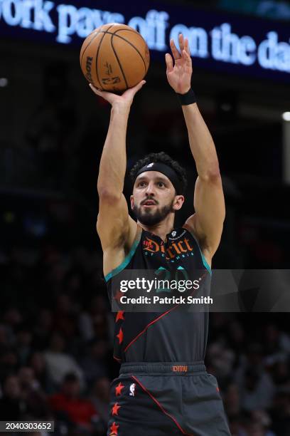 Landry Shamet of the Washington Wizards shoots against the Cleveland Cavaliers at Capital One Arena on February 25, 2024 in Washington, DC. NOTE TO...