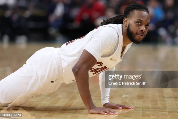 Darius Garland of the Cleveland Cavaliers reacts after scoring against the Washington Wizards at Capital One Arena on February 25, 2024 in...