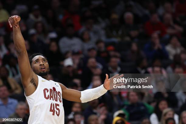 Donovan Mitchell of the Cleveland Cavaliers watches his shot against the Washington Wizards at Capital One Arena on February 25, 2024 in Washington,...
