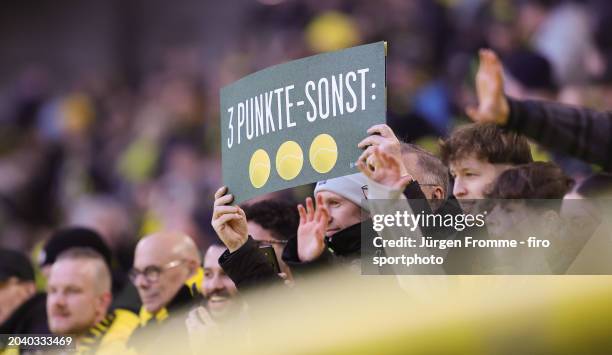 Fans with Poster 3 points as well as tennis balls before the Bundesliga match between Borussia Dortmund and TSG Hoffenheim at Signal Iduna Park on...