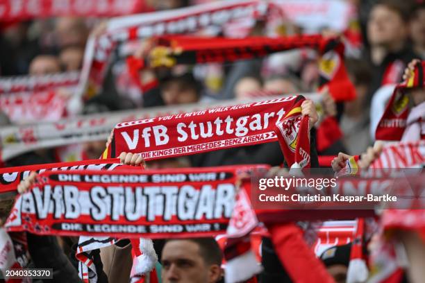 Fans of VfB Stuttgart hold their scarf to show their support during the Bundesliga match between VfB Stuttgart and 1. FC Köln at MHPArena on February...
