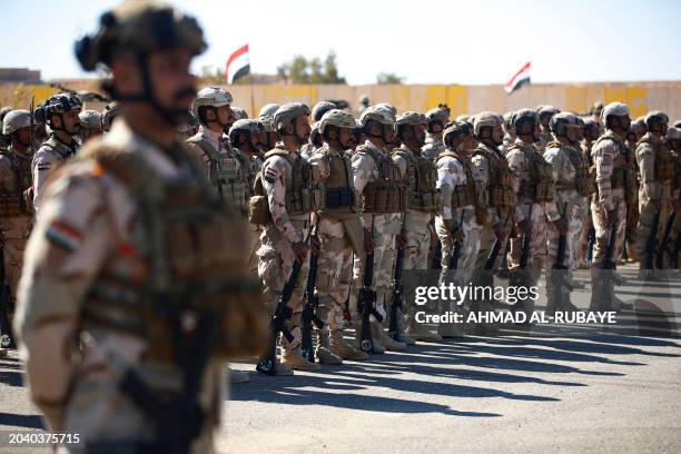 Iraqi soldiers from the new 'desert battalion' special forces take part in a graduation ceremony, after months of training by the French military, at...