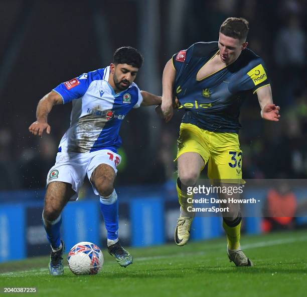 Blackburn Rovers' Dilan Markanday battles with Newcastle United's Elliot Anderson during the Emirates FA Cup Fifth Round match between Blackburn...