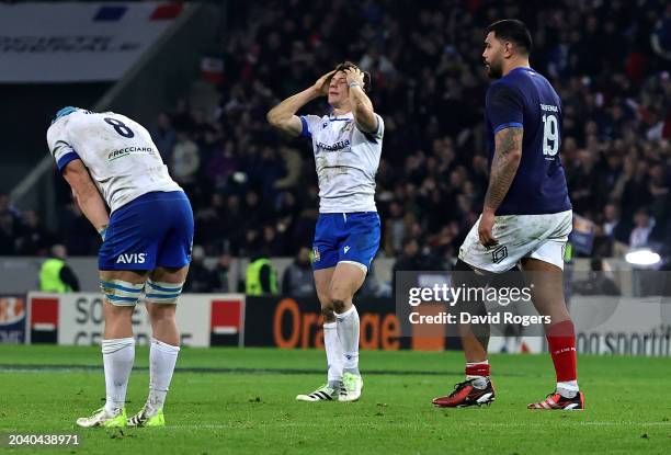 Paolo Garbisi of Italy holds his head after missing a last minute, match winning penalty during the Guinness Six Nations 2024 match between France...