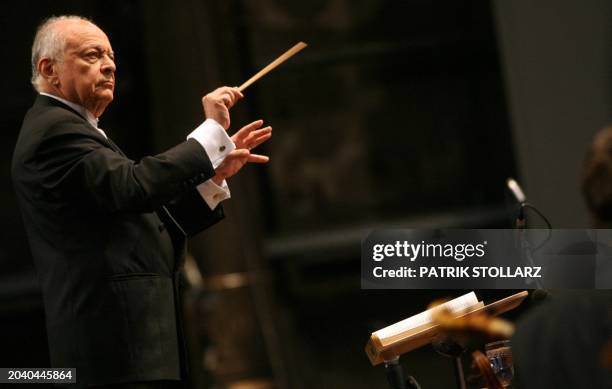 Conductor Lorin Maazel leads his orchestra, whose musicians come mainly from the Ruhr region, during the final rehearsal of "Symphony No.8 Es Dur -...