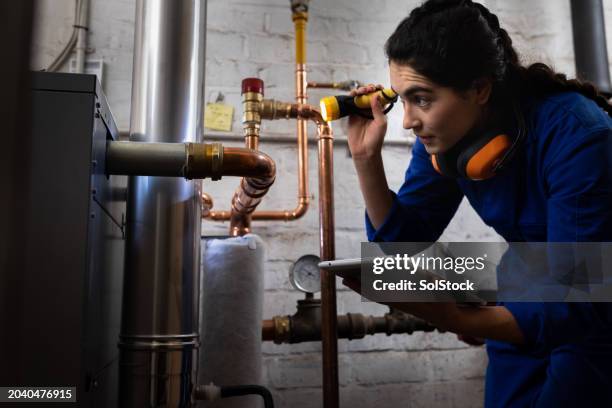 engineer working on repair - jämställdhet bildbanksfoton och bilder
