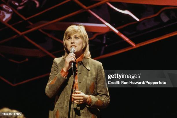 Canadian singer Anne Murray performs on the set of a pop music television show in London in September 1972.