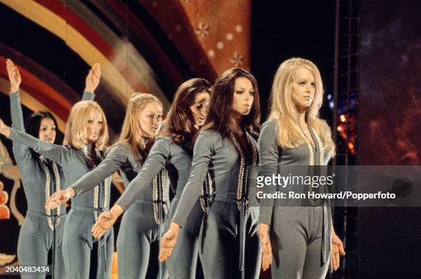 British dance troupe Pan's People perform on the set of a pop music television show in London circa 1970. From left, Ruth Pearson, Flick Colby, Andi...