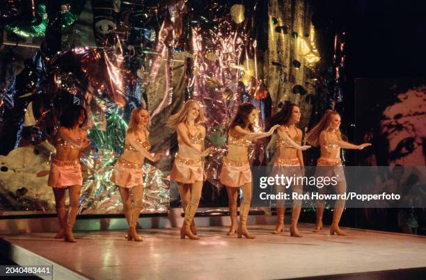 British dance troupe Pan's People perform on the set of a pop music television show in London circa 1970. From left, Ruth Pearson, Andi Rutherford,...