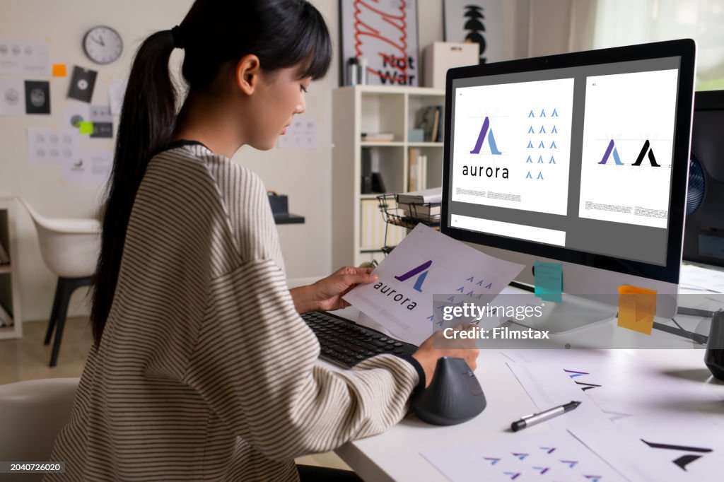 Asian Graphic designer working in office. Designing logo Artist Creative Designer Illustrator Graphic Skill Concept.