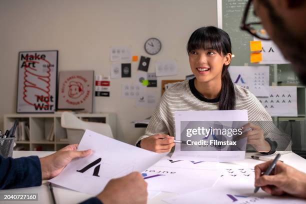 group of asian graphic designer working in office. brain storming, artist creative designer illustrator graphic skill concept. - east asian works of art specialist stock pictures, royalty-free photos & images