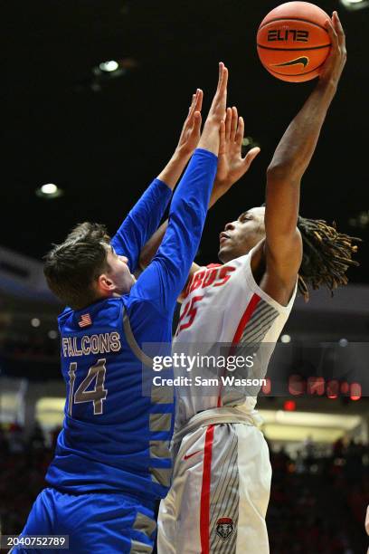 Toppin of the New Mexico Lobos shoots against Beau Becker of the Air Force Falcons during the second half at The Pit on February 24, 2024 in...