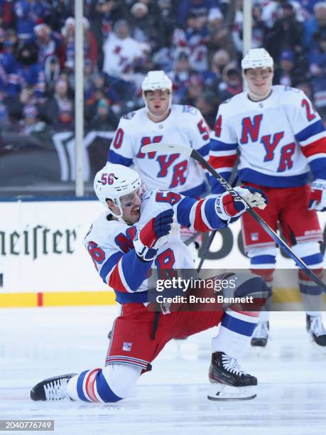 Erik Gustafsson of the New York Rangers celebrates his goal against the New York Islanders during the 2004 Navy Federal Credit Union Stadium Series...