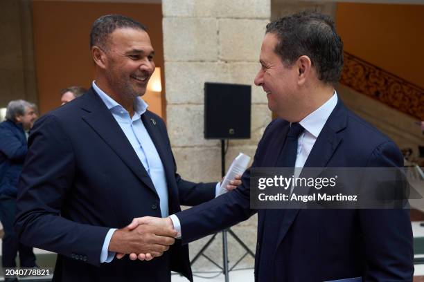 Laureus Academy Member Ruud Gullit shakes hands with Guy Sanan, Director of Laureus World Sports Awards, during the Laureus World Sports Awards 2024...