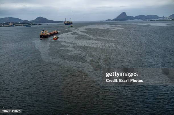 Oil spills, heavy vessel and ship traffic inside Guanabara Bay, the bay has been heavily impacted by urbanization, deforestation, and pollution of...
