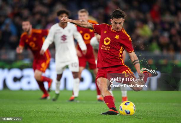 Paulo Dybala of AS Roma scores his team's first goal from the penalty-spot during the Serie A TIM match between AS Roma and Torino FC at Stadio...