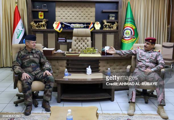 Lieutenant-General Thierry Garreta, Deputy Chief of Staff for Operations for the French army meets with Lieutenant General Abdul Amir Yarallah, Chief...