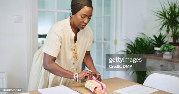 wrapping, gift box and woman with tape in home and birthday, surprise and mom in living room with package decoration. packaging, present and mother prepare with paper for celebration in house - day anniversary stock pictures, royalty-free photos & images