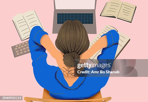 High angle view businesswoman working at laptop with hands behind head High angle view businesswoman working at laptop with hands behind head