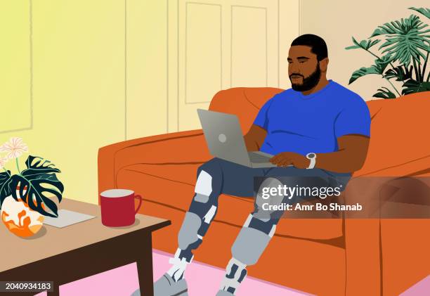 man with prosthetic legs working from home at laptop on living room sofa - computer software stock illustrations