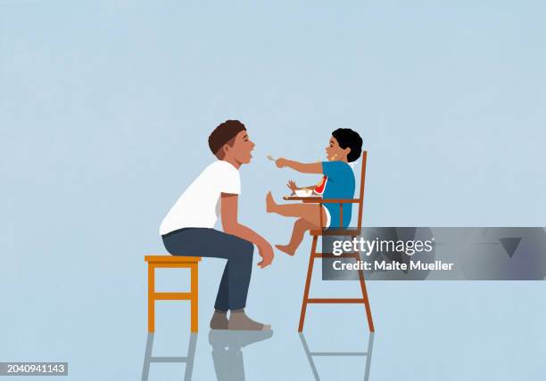 baby son in high chair feeding father - child eating stock illustrations