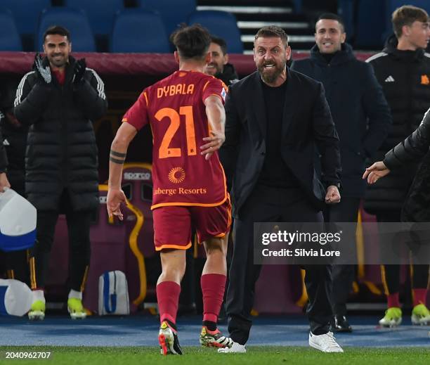 Paulo Dybala of AS Roma celebrates with Daniele De Rossi head coach of AS Roma after scoring goal 2-1 during the Serie A TIM match between AS Roma...