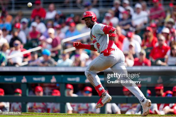 Jordan Walker of the St. Louis Cardinals runs to first base against the Miami Marlins during the fifth inning of a spring training game at Roger Dean...