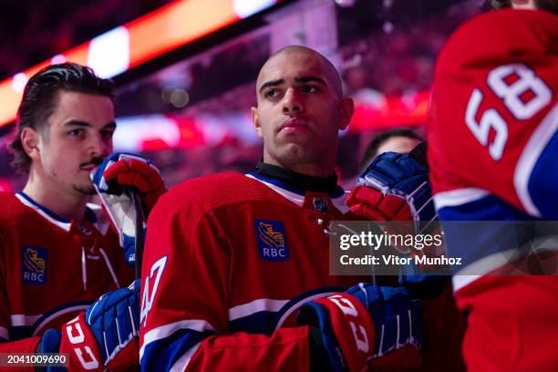 Jayden Struble of the Montreal Canadiens looks on during the national anthem of the NHL regular season game between the Montreal Canadiens and the...