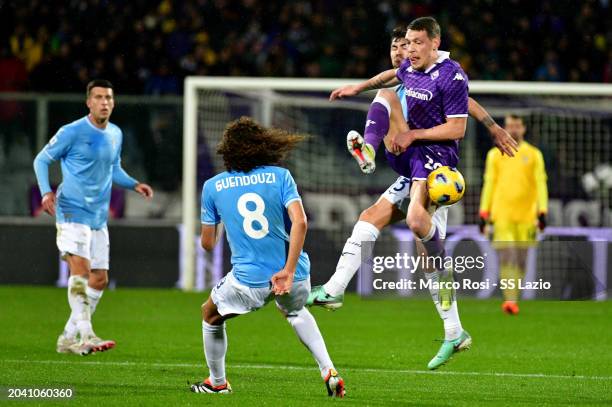 Alessio Romagnoli of SS Lazio compete for the ball with Andrea Belotti ACF Fiorentina during the Serie A TIM match between ACF Fiorentina and SS...