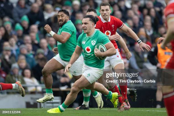 February 24: James Lowe of Ireland makes a break supported by Bundee Aki of Ireland during the Ireland V Wales, Six Nations rugby union match at...