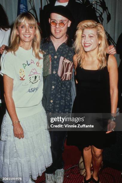 British-born Australian singer Olivia Newton-John, British musician Thomas Dolby, and American singer and songwriter Taylor Dayne attend a preview...