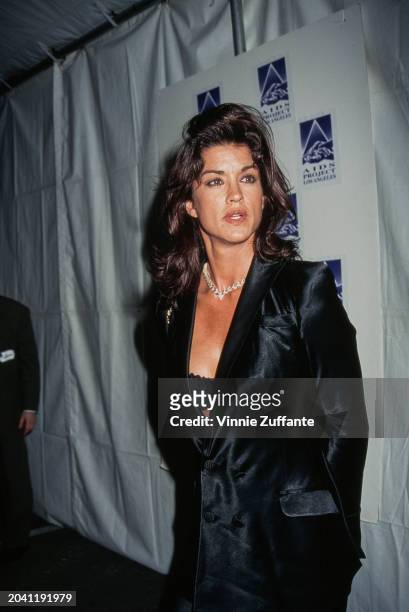 American fashion model Janice Dickinson, wearing a black jacket, attends the AIDS Project Los Angeles 'Commitment to Life' charity benefit, held at...