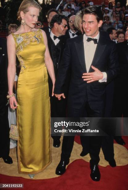 Married couple, actors Nicole Kidman and Tom Cruise, arrive on the red carpet at the 69th Annual Academy Awards, in Los Angeles, US, 24th March 1997.