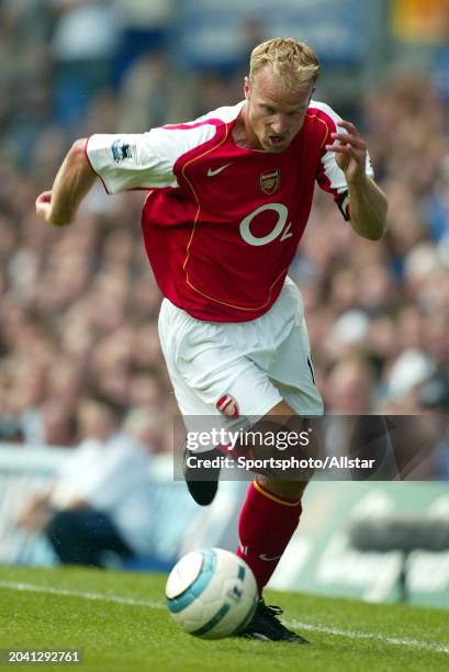 Dennis Bergkamp of Arsenal on the ball during the Premier League match between Everton and Arsenal at Goodison Park on August 15, 2004 in Liverpool,...