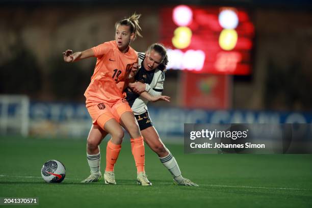 Eva Oude Elberink of the Netherlands and Carlotta Schwoerer of Germany fight for the ball during the U19 Women's Netherlands v U19 Women's Germany -...