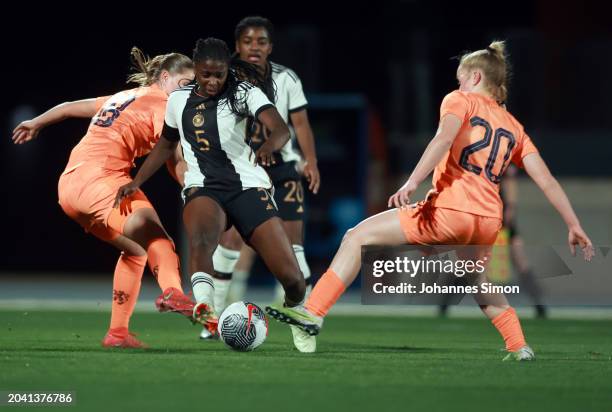 Ilse Kemper and Senne van de Velde of the Netherlands and Emily Wallrabenstein of Germany fight for the ball during the U19 Women's Netherlands v U19...