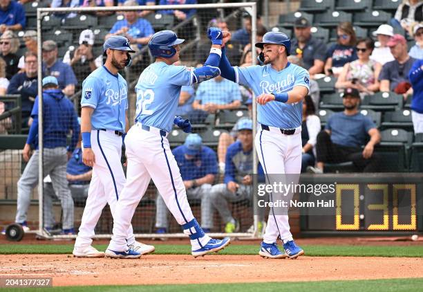 Nick Pratto of the Kansas City Royals celebrates with Michael Massey after hitting a three run home run against the Chicago Cubs during the first...